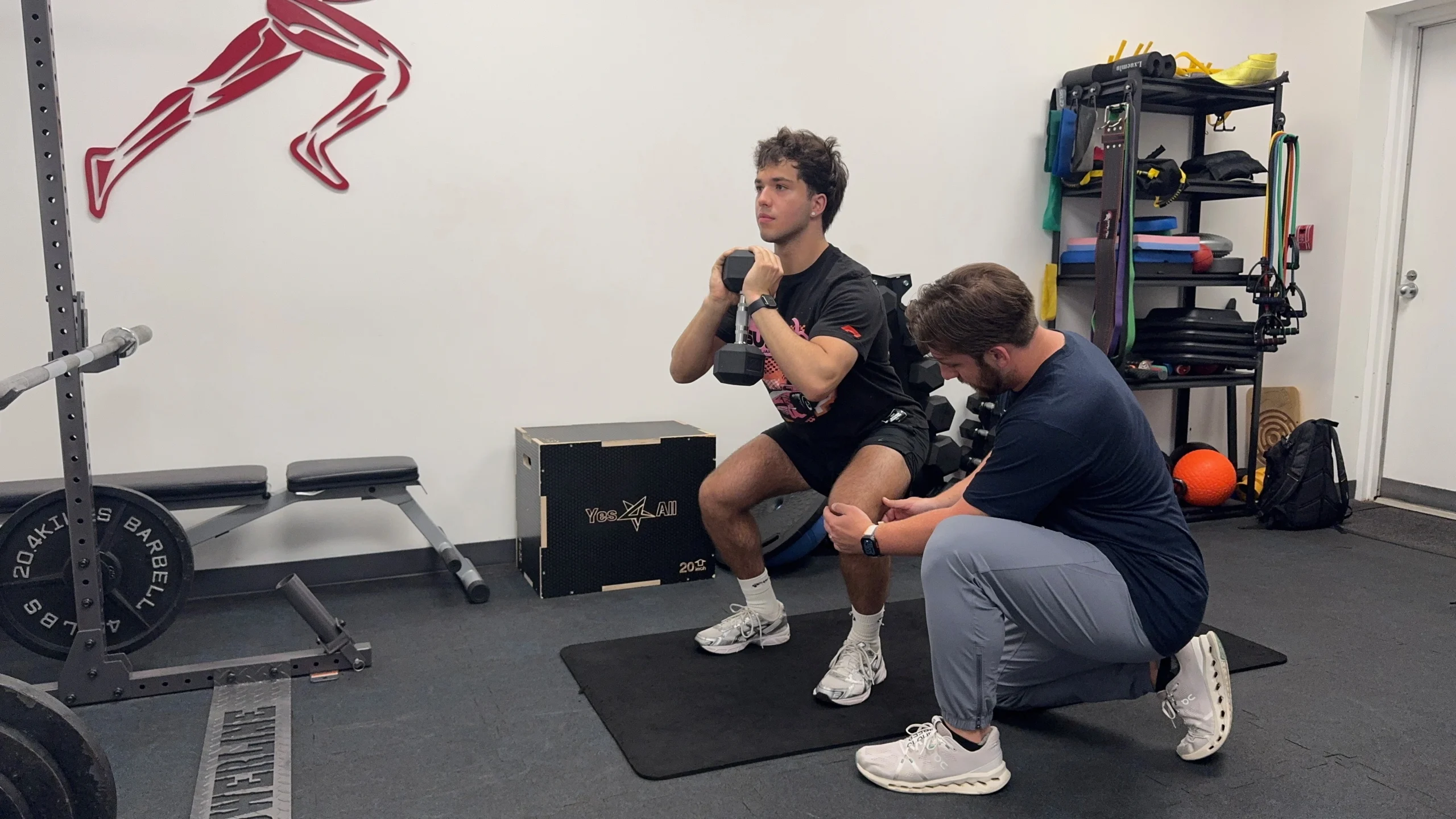 Dr Maxwell Warren performing a baseball and softball movement analysis at Elite Performance Institute in Naperville Illinois